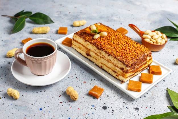 Delicious caramel and peanut cake with peanuts and caramel candies,top view