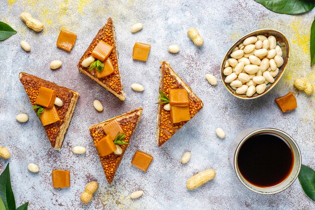 Delicious caramel and peanut cake with peanuts and caramel candies