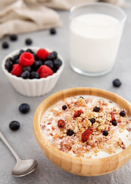 Delicious cereals and yogurt with forest fruit