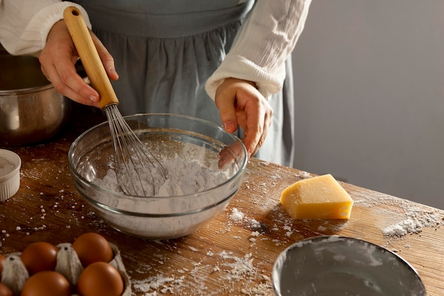 Free photo delicious cheese bread making arrangement