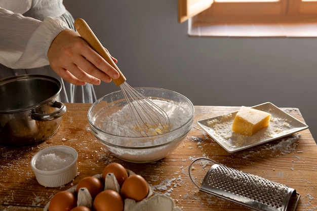 Free photo delicious cheese bread making arrangement