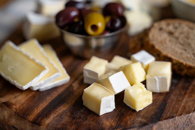 Delicious cheese and olives assortment