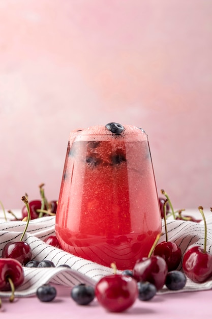 Free photo delicious cherry and blueberry drink