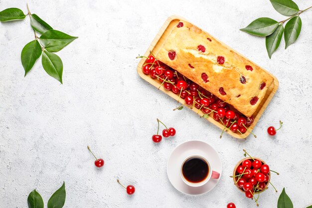 Delicious cherry cake with fresh cherries,top view