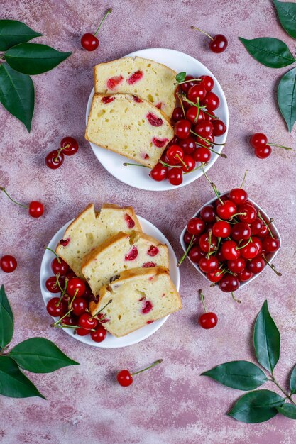 Delicious cherry cake with fresh cherries, top view