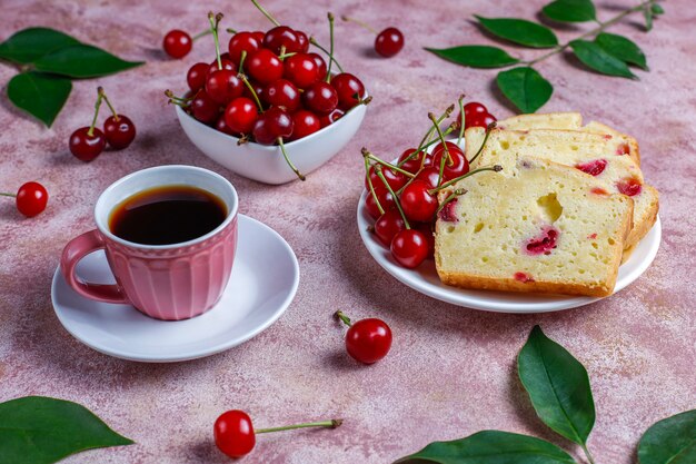 Delicious cherry cake with fresh cherries, top view