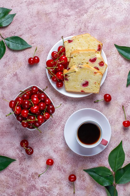 Delicious cherry cake with fresh cherries, top view