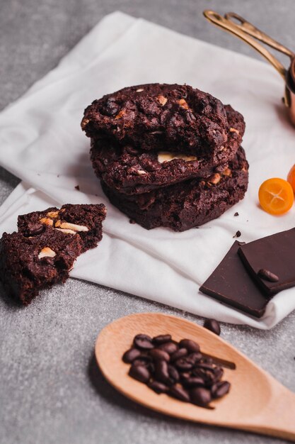 Delicious chocolate biscuits and wooden spoon