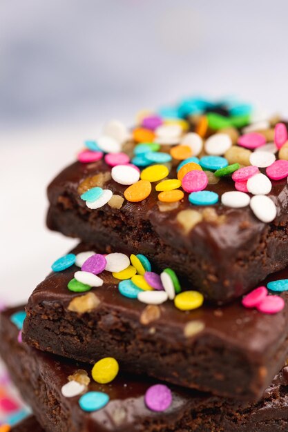 Delicious chocolate brownies with colorful sprinkles
