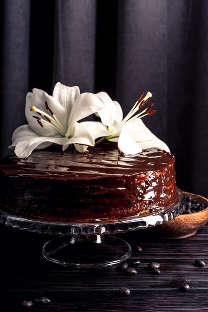 Delicious chocolate cake with lily