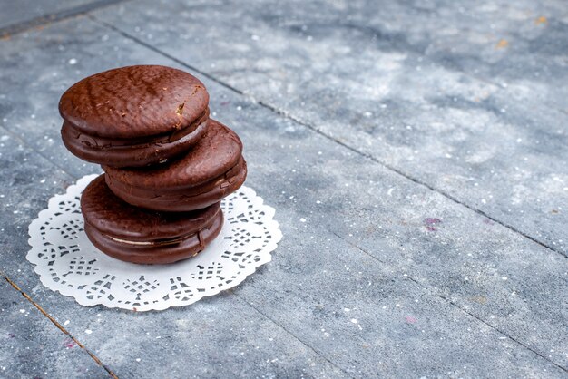 delicious chocolate cakes round formed isolated on grey, bake chocolate cake cocoa sweet biscuit