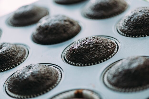 Delicious chocolate cupcakes in tin