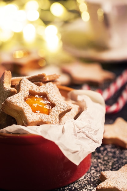 Free photo delicious christmas cookies with orange jam