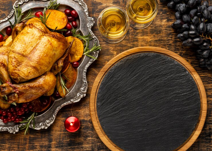 Free Photo delicious christmas dish assortment with empty black wooden board