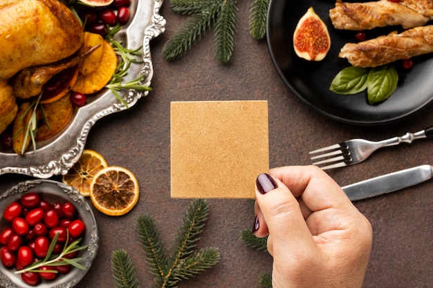 Delicious christmas dish assortment with empty card