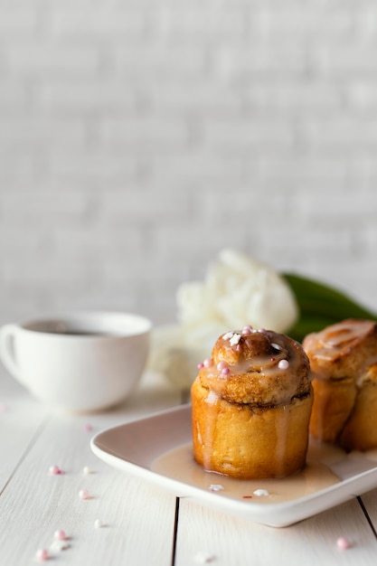 Delicious cinnamon roll on plate