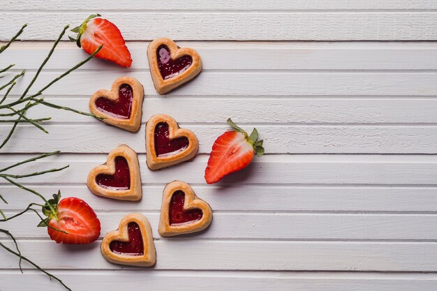 Delicious cookies and juicy strawberries