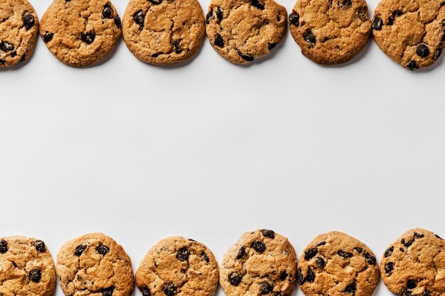 Delicious cookies in row with copy space