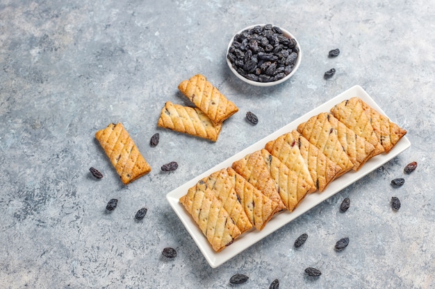 Delicious cookies with raisin, top view