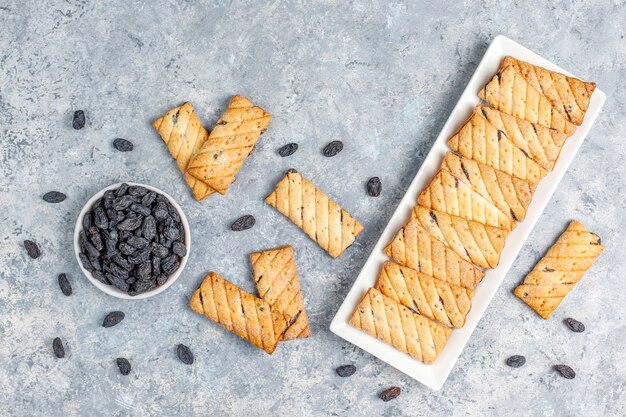 Delicious cookies with raisin, top view