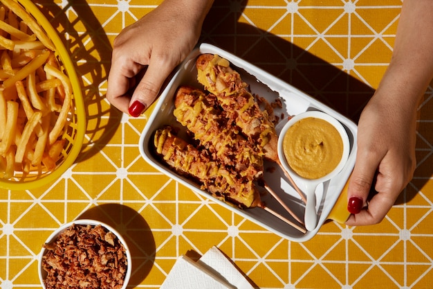 Free photo delicious corn dog meal