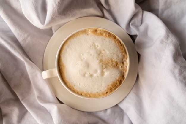 Бесплатное фото Вкусная чашка кофе со сливками