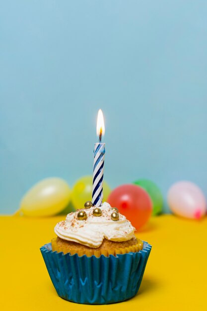 Delicious cupcake on table for birthday party