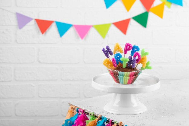 Delicious cupcake with party decorations