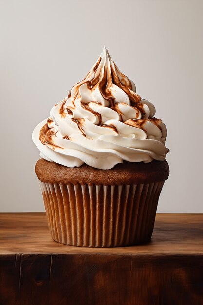 Delicious cupcake with vanilla and chocolate glaze