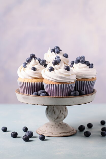 Delicious cupcakes with blueberries