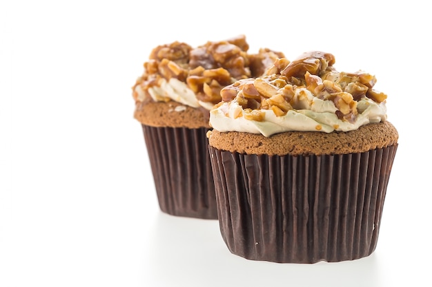 Delicious cupcakes with peanuts and caramel