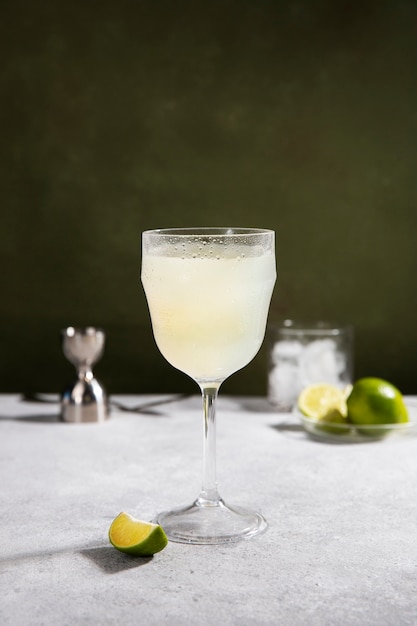 Delicious daiquiri cocktail glass with lime