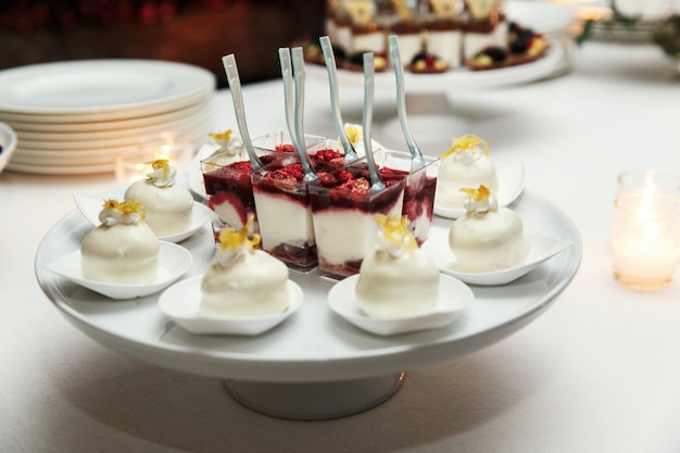 Delicious desserts with white chocolate served on the dish