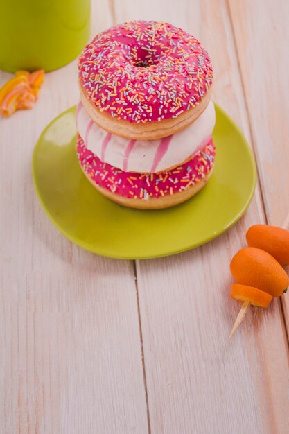 Delicious donuts with colourful sprinkles