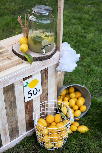 Free photo delicious drinks by lemonade stand