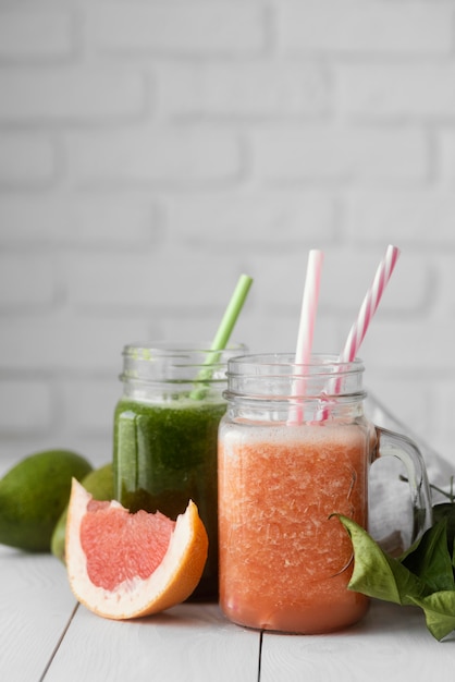 Delicious drinks with leaves and grapefruit