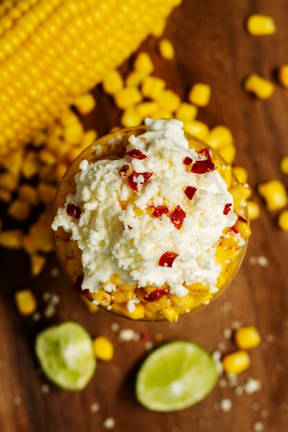 Delicious esquites in cup top view