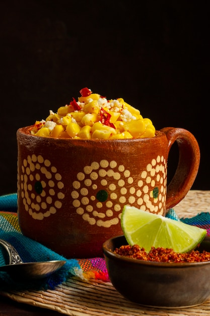 Delicious esquites in mug