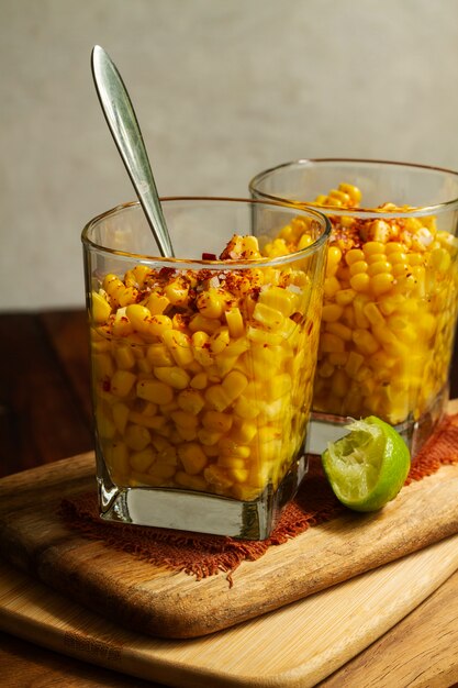 delicious esquites with spices arrangement