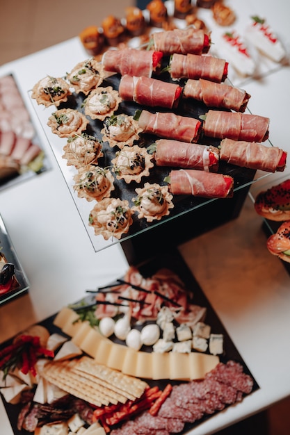 Delicious festive buffet with canapes and different delicious meals