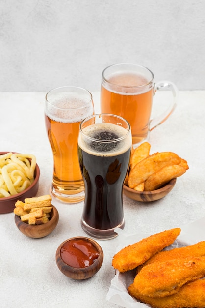 Delicious food and beer glasses