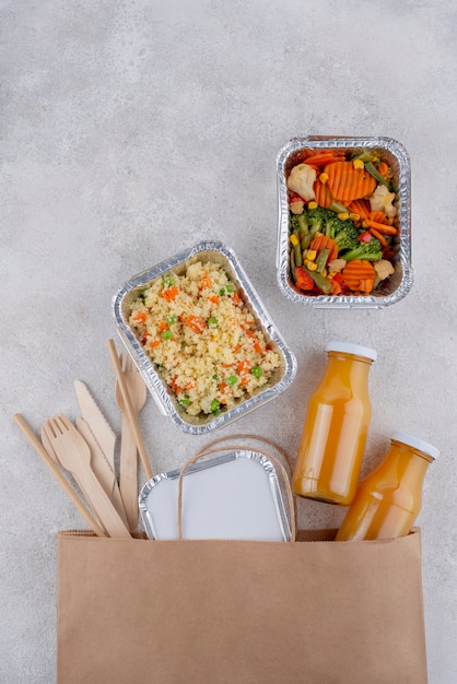 Free photo delicious food packs arrangement top view