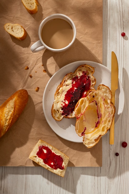 Delicious french breakfast with jam top view