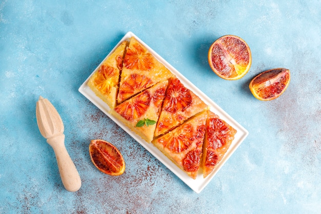 Delicious french dessert tart tatin with blood orange