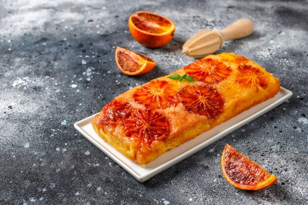 Delicious french dessert tart tatin with blood orange.