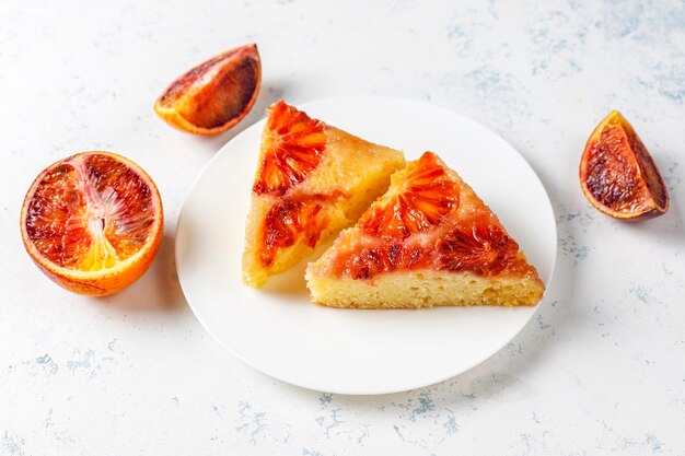 Delicious french dessert tart tatin with blood orange.