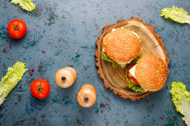 Delicious fresh homemade burgers on dark