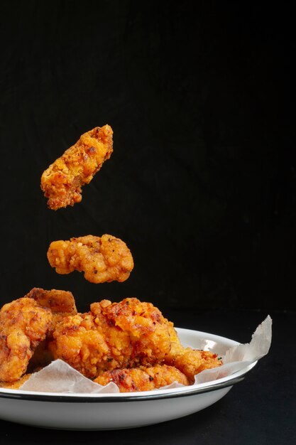 Delicious fried chicken on plate