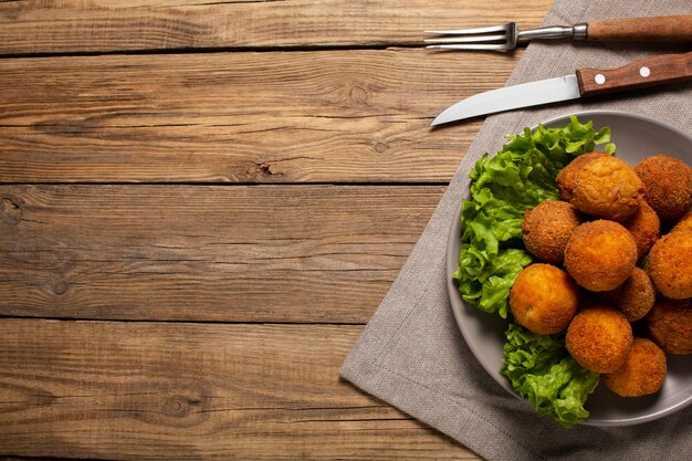 Delicious fried food croquettes with copy space