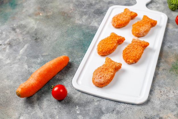 Free photo delicious frozen fish nuggets.